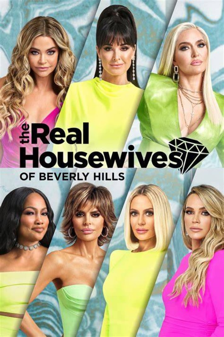 Stunner:&nbsp;The Real Housewives Of Beverly Hills star, 54, wore a red hot look as she showed off her trim frame on the red carpet in an off-the-shoulder vivid tulle gown